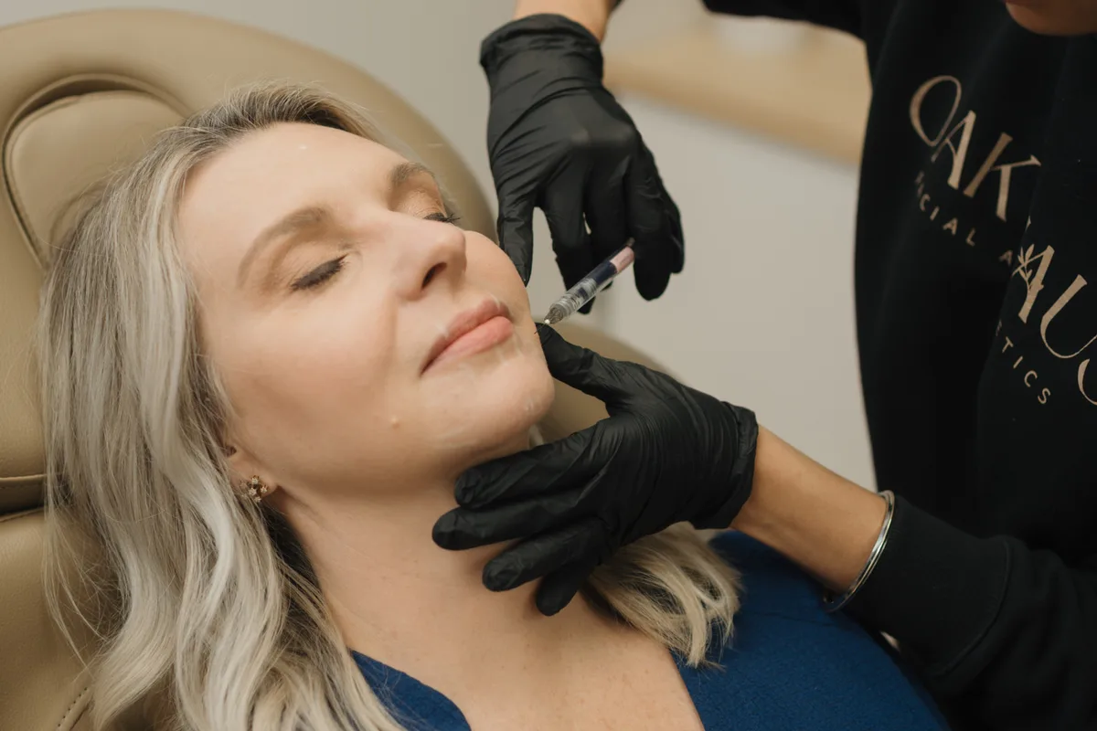 Provider performing injectable treatment at Oak Haus