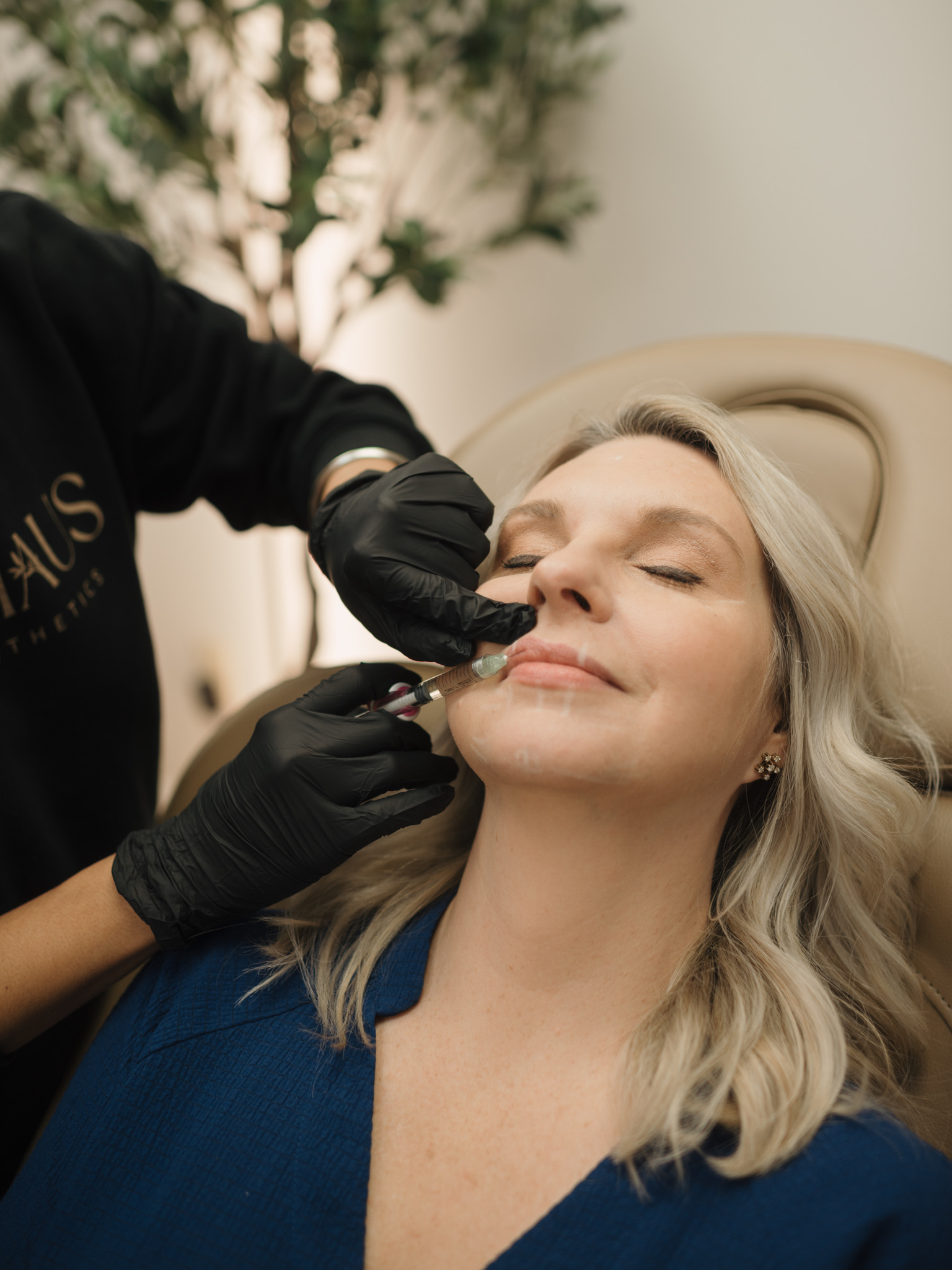 Gurpreet performing a dermal filler treatment at Oak Haus