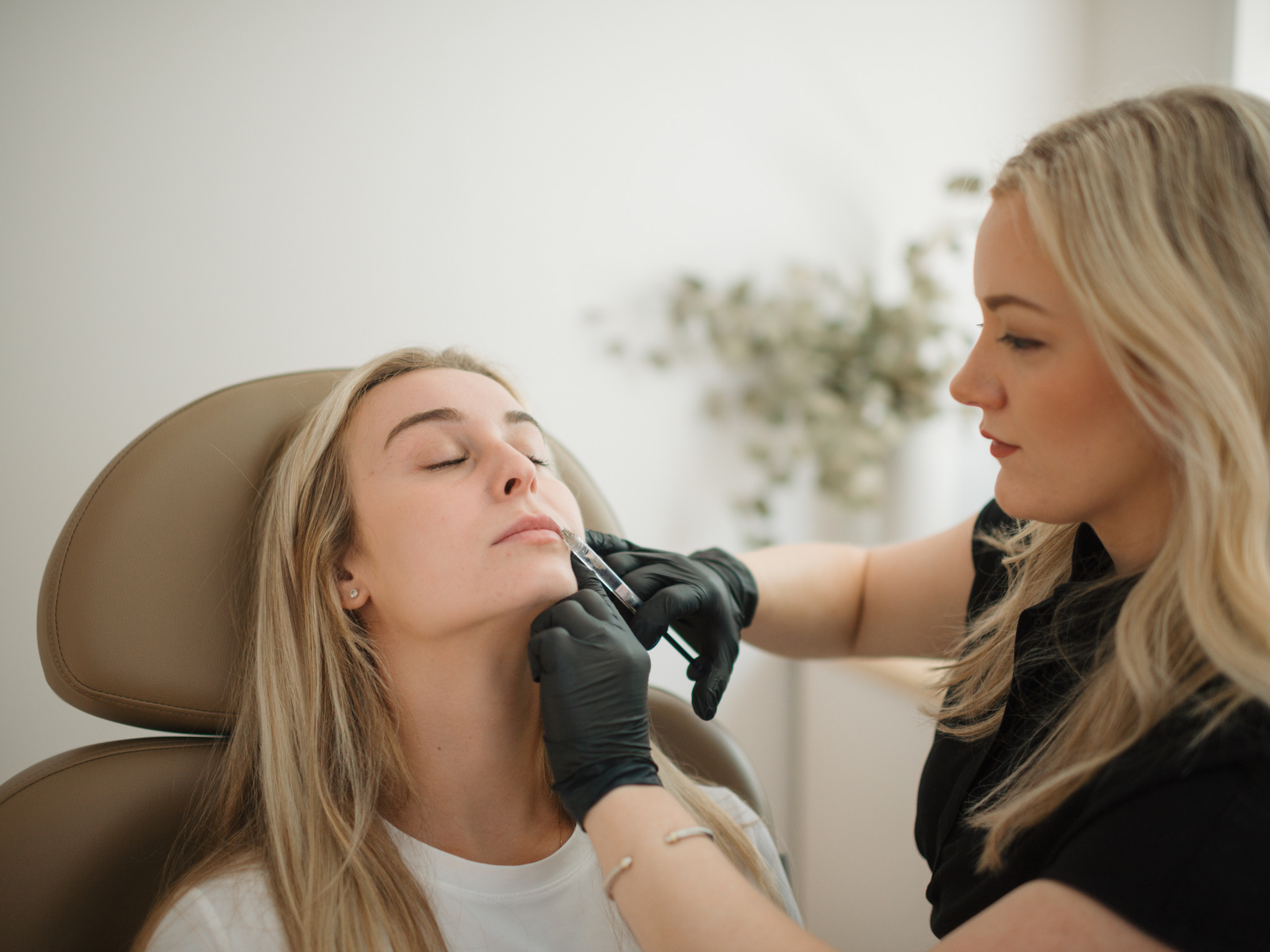 Jessica performing a dermal filler treatment at Oak Haus